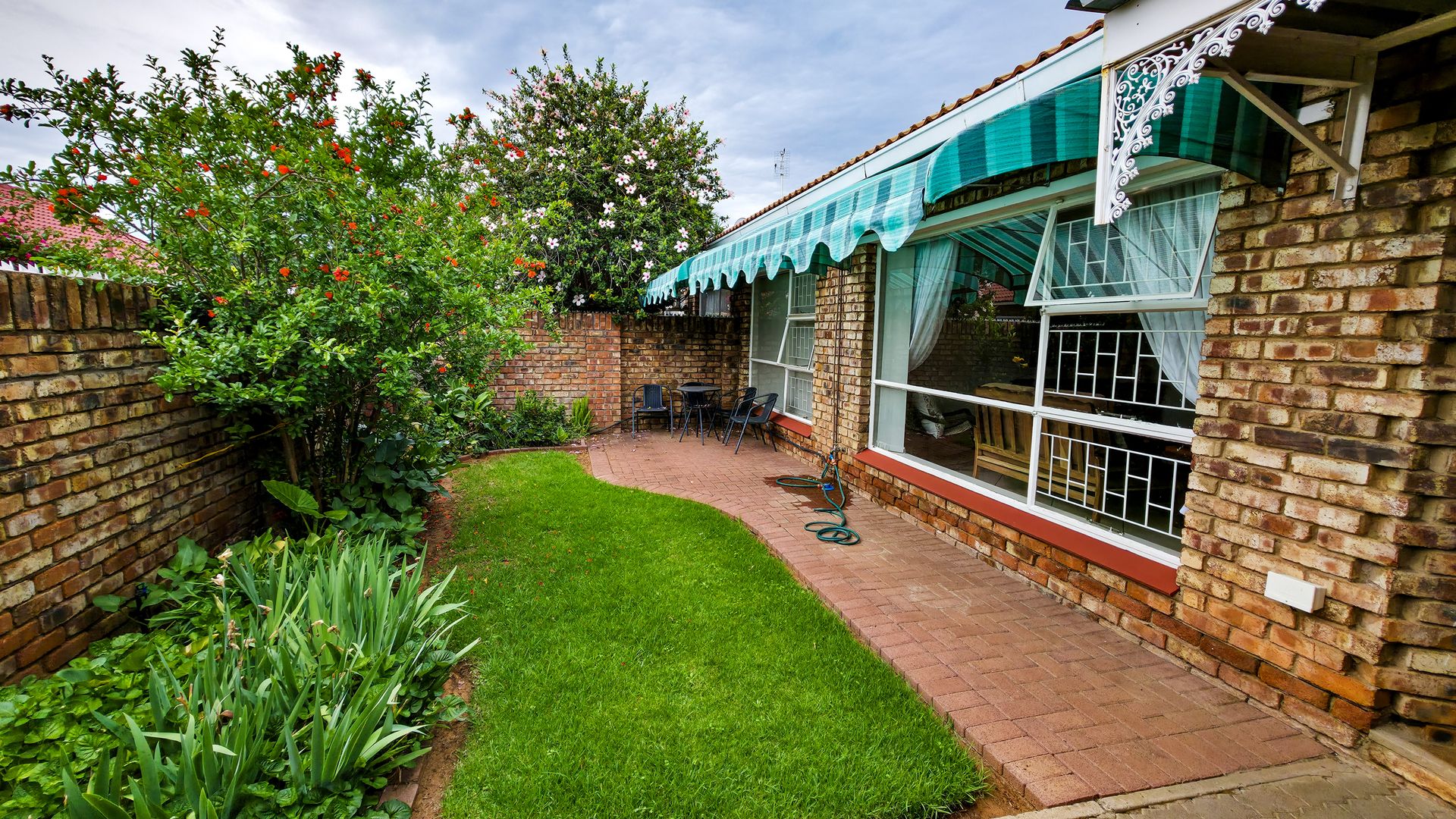 Neat 2-Bedroom Townhouse with Lock-Up Garage and JoJo Tank