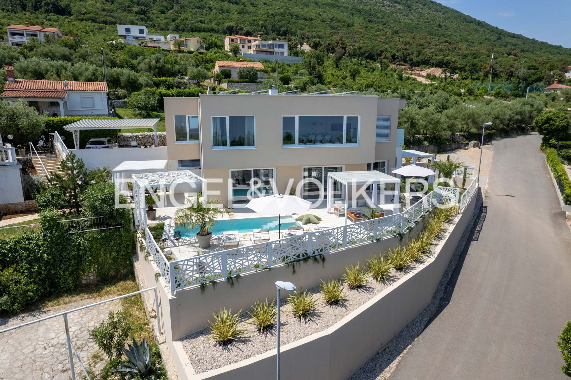 Modern elegance with panoramic sea views in a picturesque hillside location - just 450 metres from the Adriatic coast