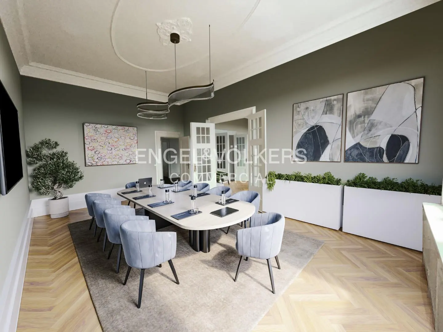 A modern conference room with a long table, blue chairs, and abstract art. The room has herringbone floors and a neutral color scheme.