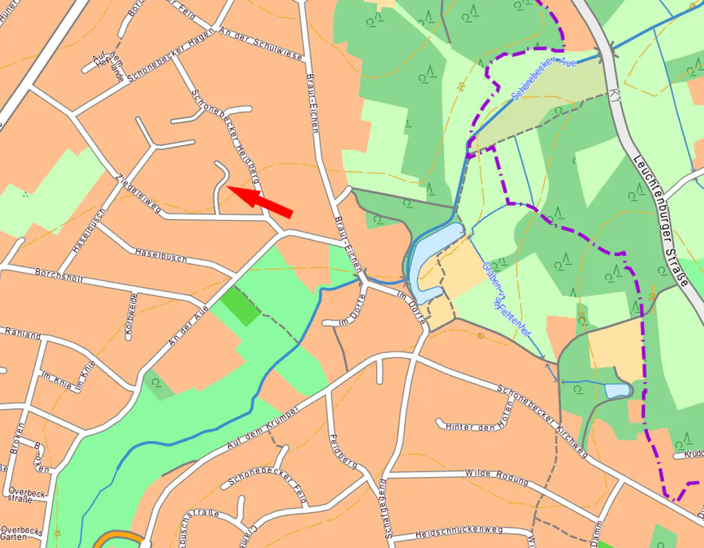 Map section with streets, green spaces, and a red arrow pointing to Schonebecker Heideweg.