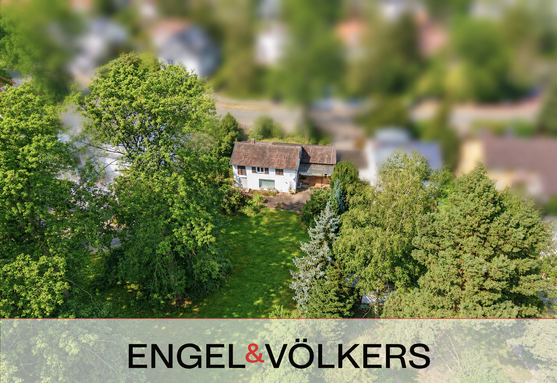Aerial view of a white house with a brown roof nestled among lush green trees and a lawn, with a blurred neighborhood background. [AI-generated text]