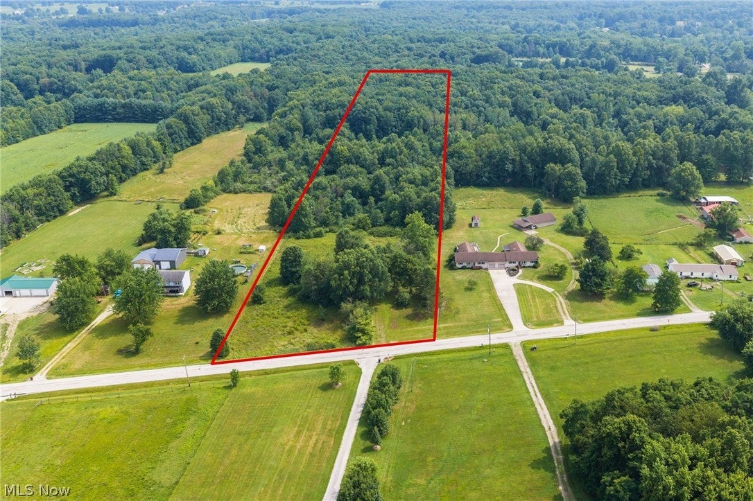 7+ Wooded Vacant Parcel in Paris Township