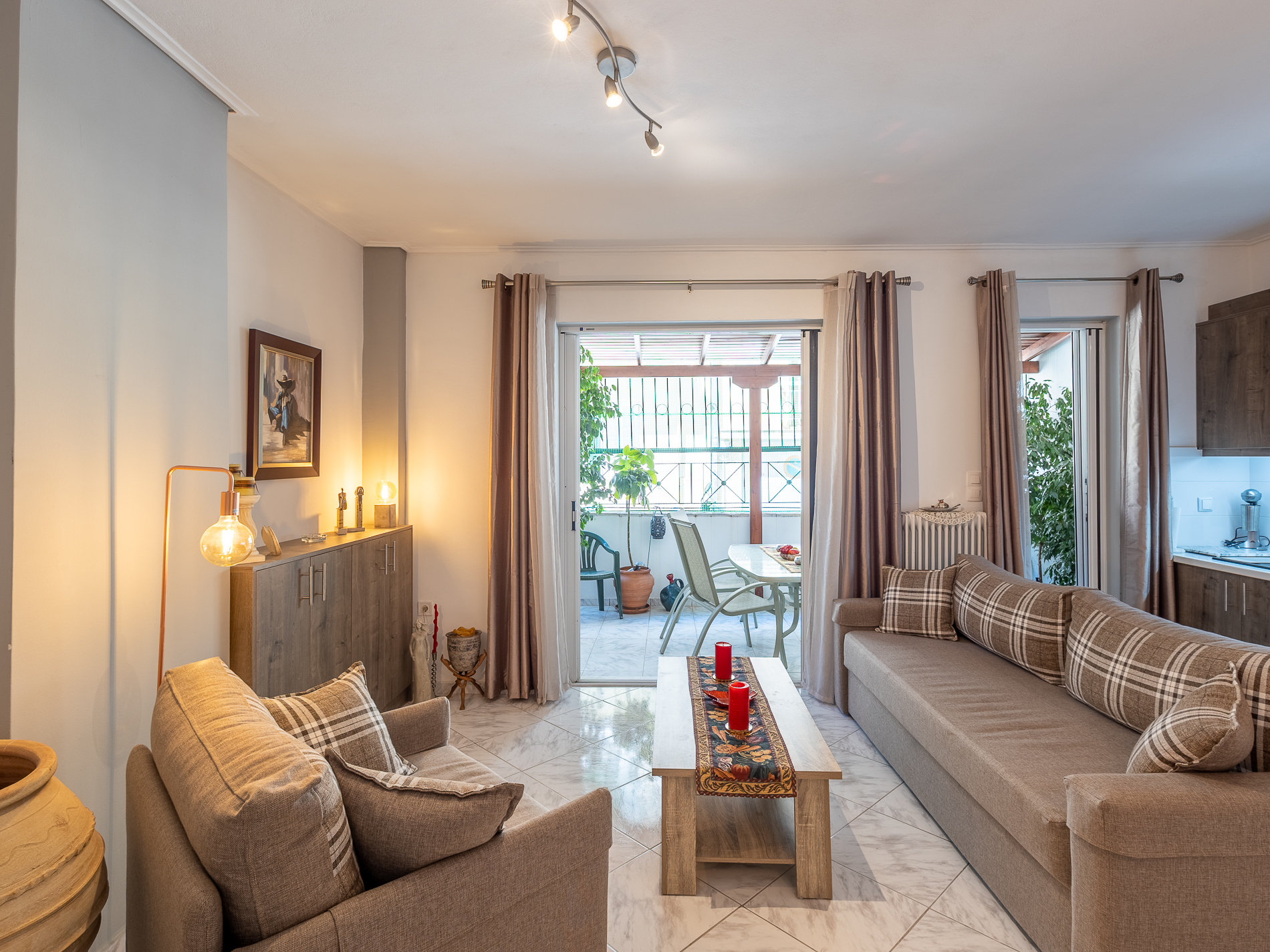 Turn‑key 1BR with large veranda & private parking