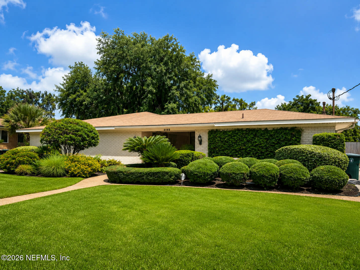 Experience Timeless Elegance in Highly Desired Neighborhood