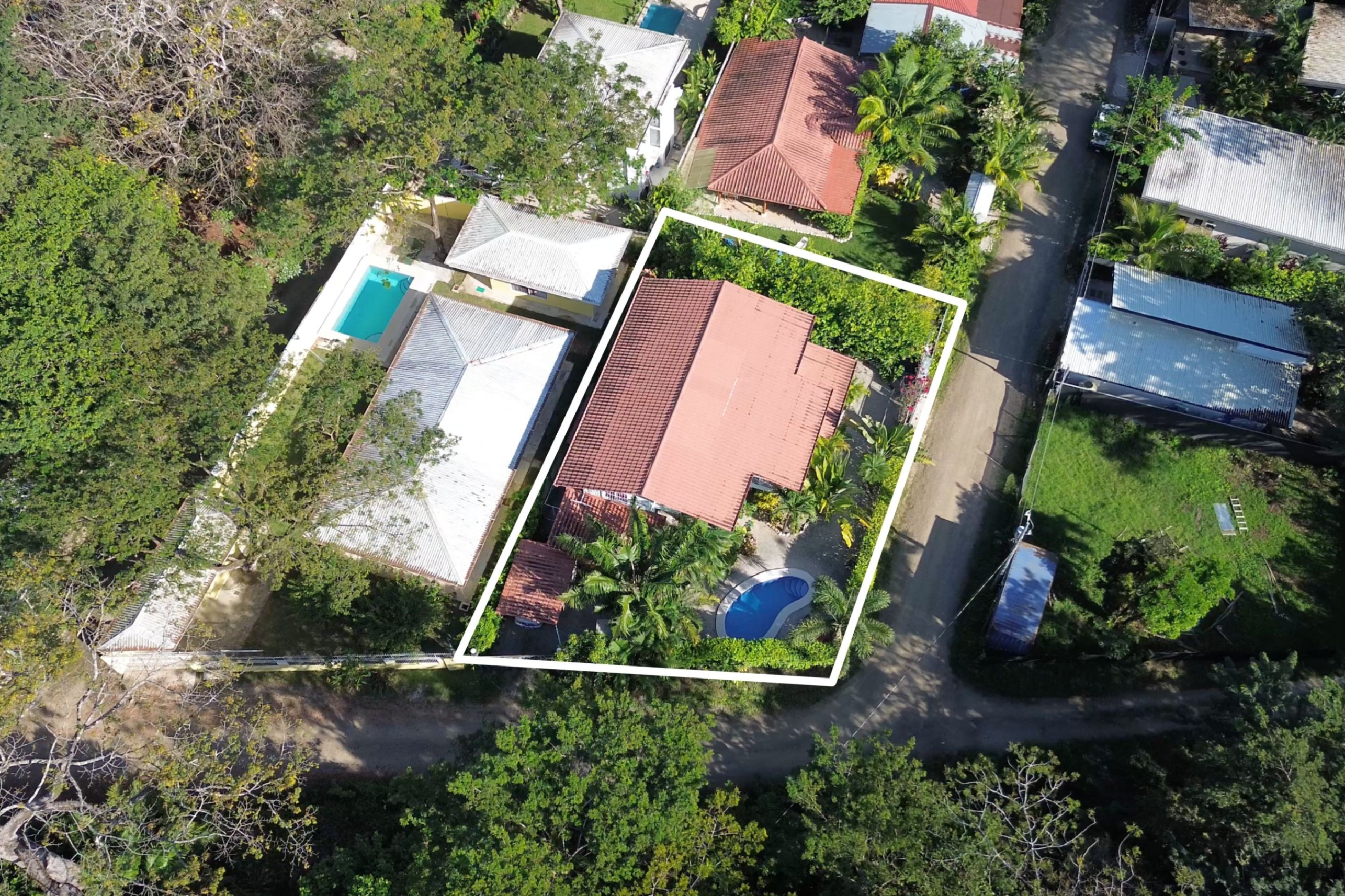 Turnkey Beach Business with 4 Residential Units