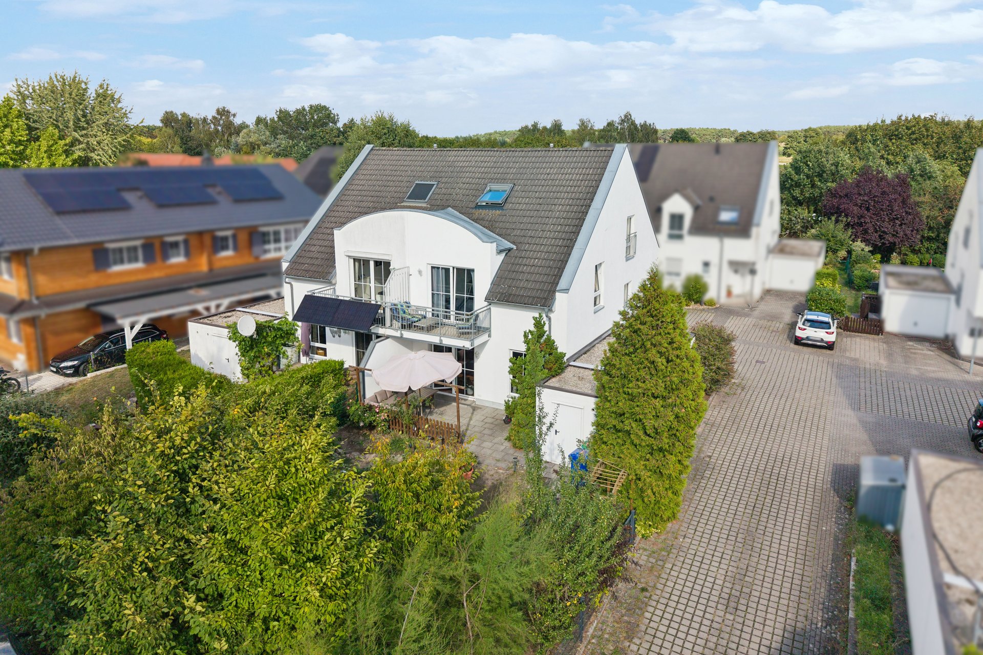 Kapitalanlage am Motzener See: vermietete Doppelhaushälfte mit Westgarten