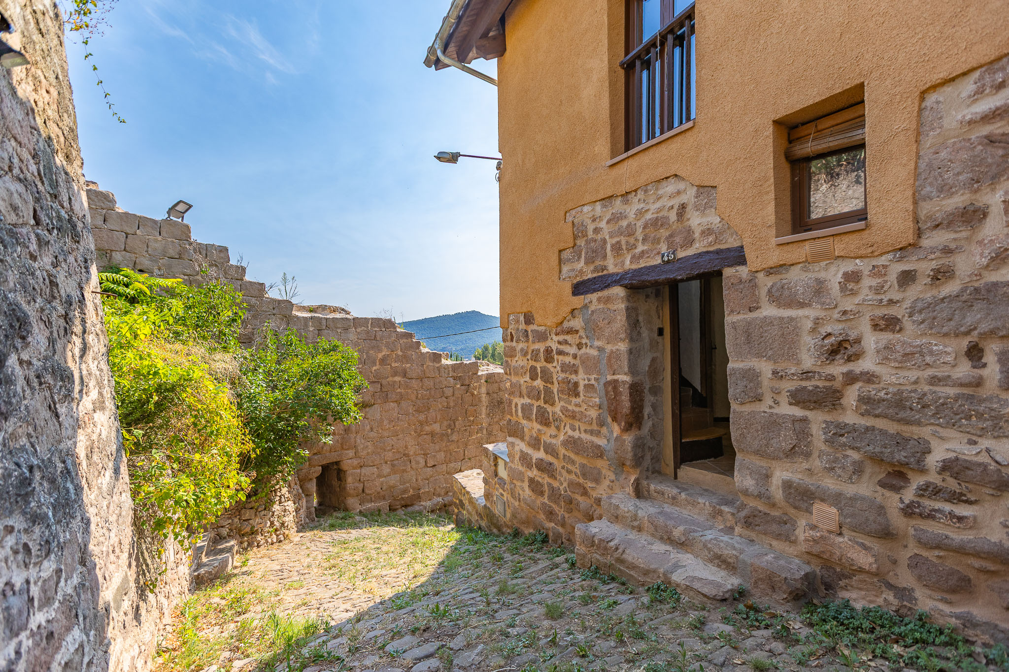 Live within history. A charming home in the heart of Cardona’s medieval walled town.