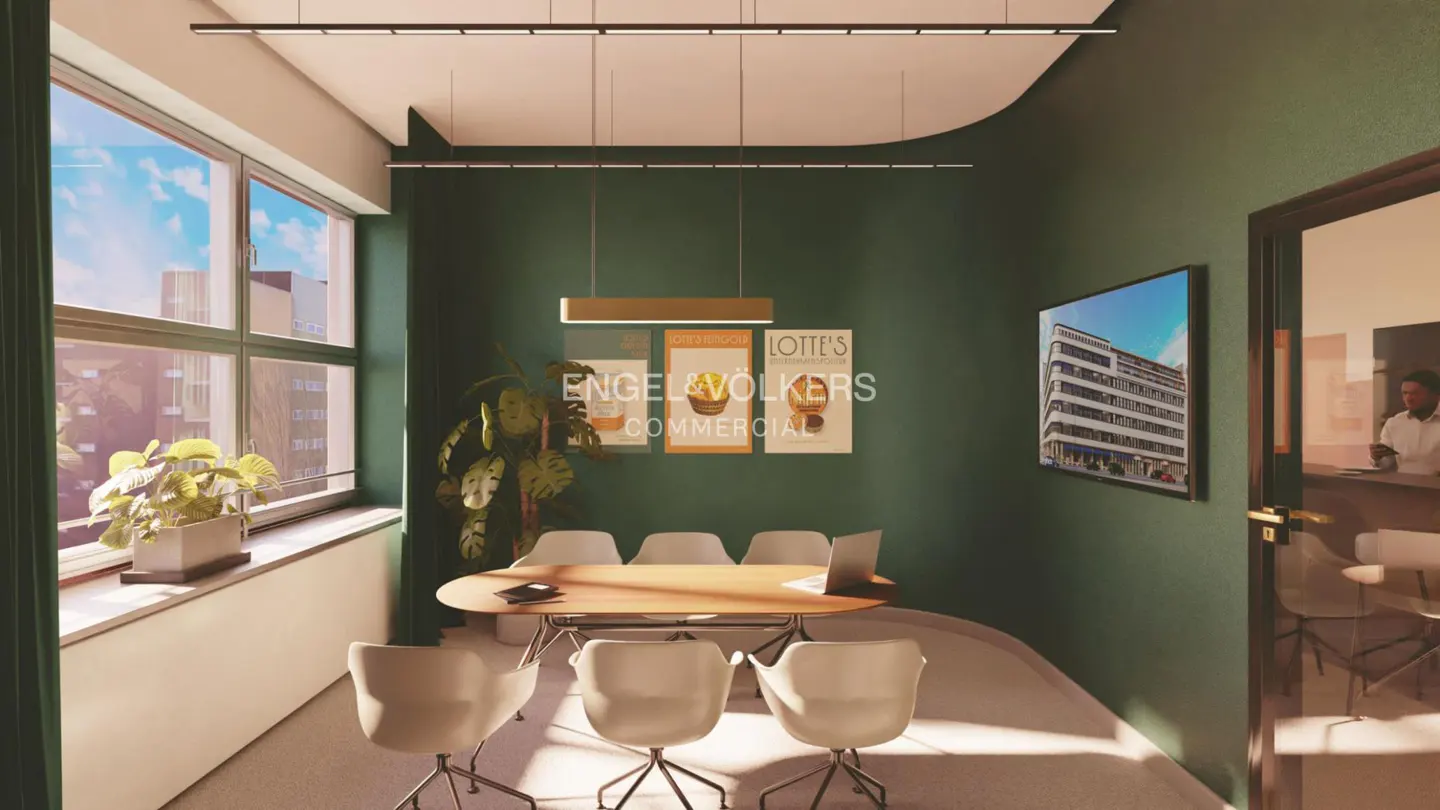 A modern office space with green walls, a wooden conference table, and white chairs. A large window offers a city view.