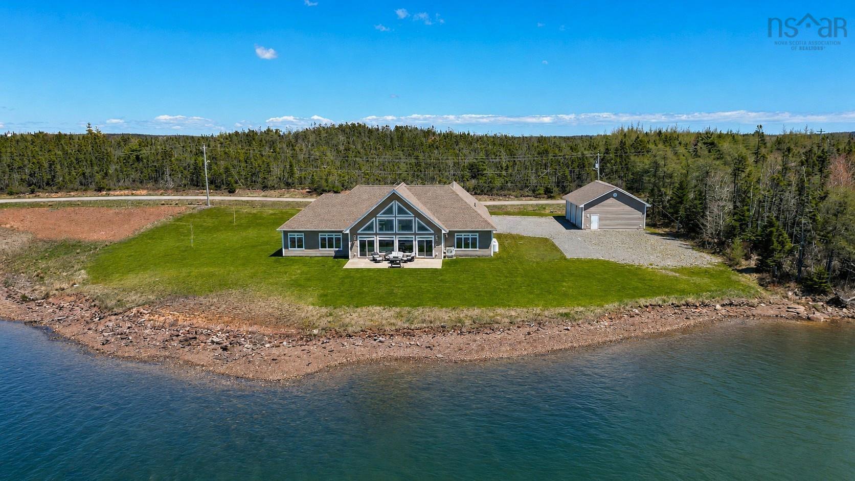 Luxurious Seal Cove Waterfront Home with Massive Garages