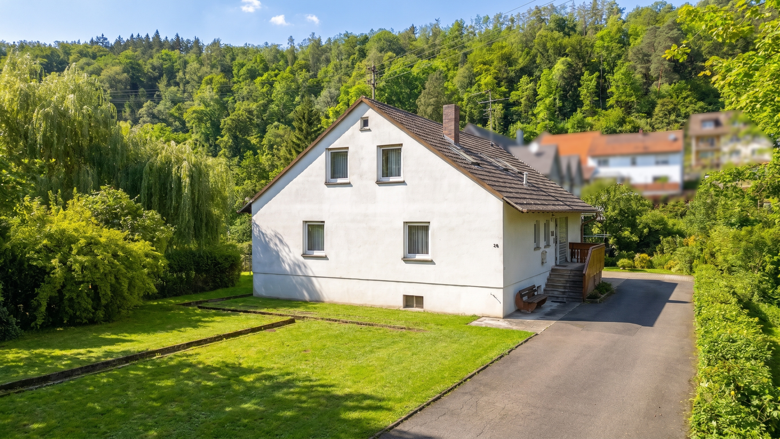 Mehr Platz für die Familie – Einfamilienhaus mit Einliegerwohnung & großem Garten