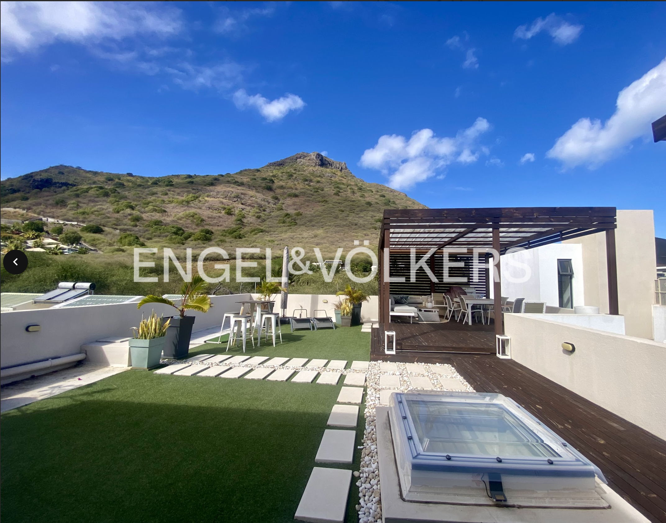 Luxurious West Coast Penthouse with Private Rooftop Oasis