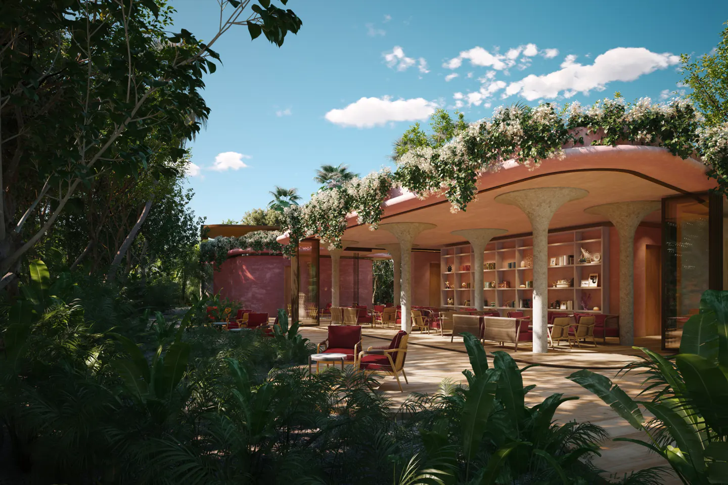 Outdoor lounge area with pink walls, white flowers, and lush greenery under a blue sky with clouds.