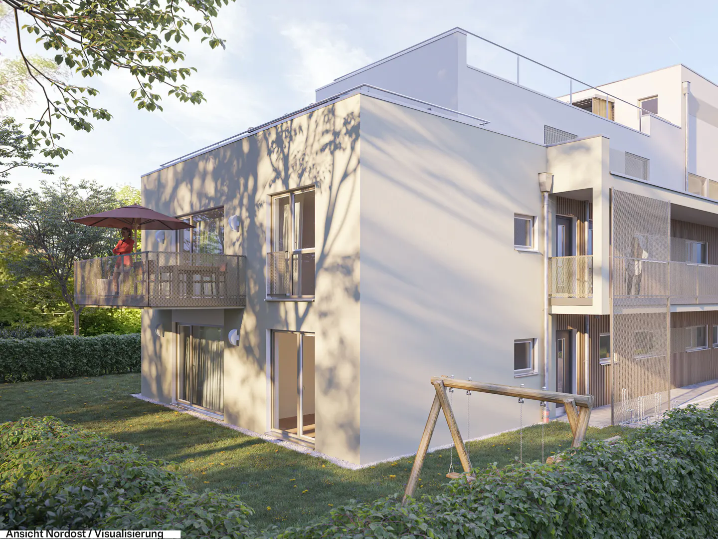 Modern apartment building with balconies, a small playground, and green landscaping under a bright, sunny sky.