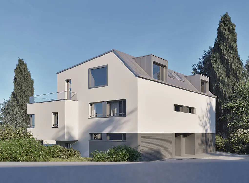Modern white and grey two-story house with a balcony and metal roof, surrounded by green trees under a clear blue sky.