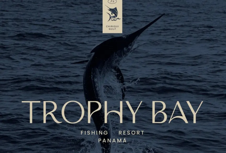 A marlin leaps from the ocean, with "Trophy Bay Fishing Resort Panamá" text overlayed.