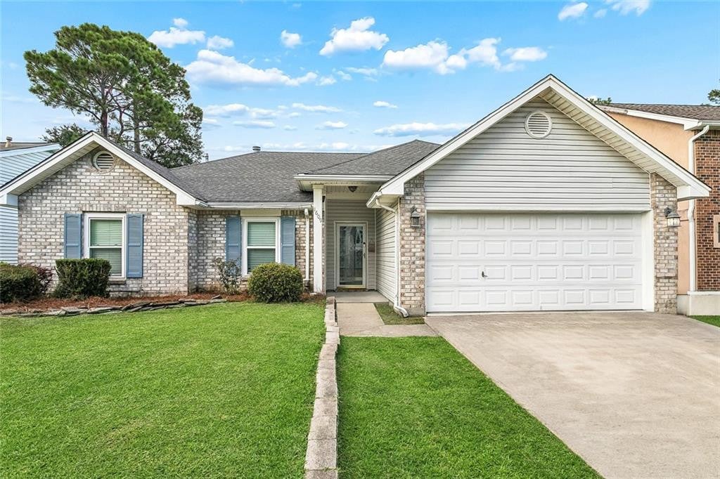 Charming 3-Bedroom with Enclosed Den & Fireplace