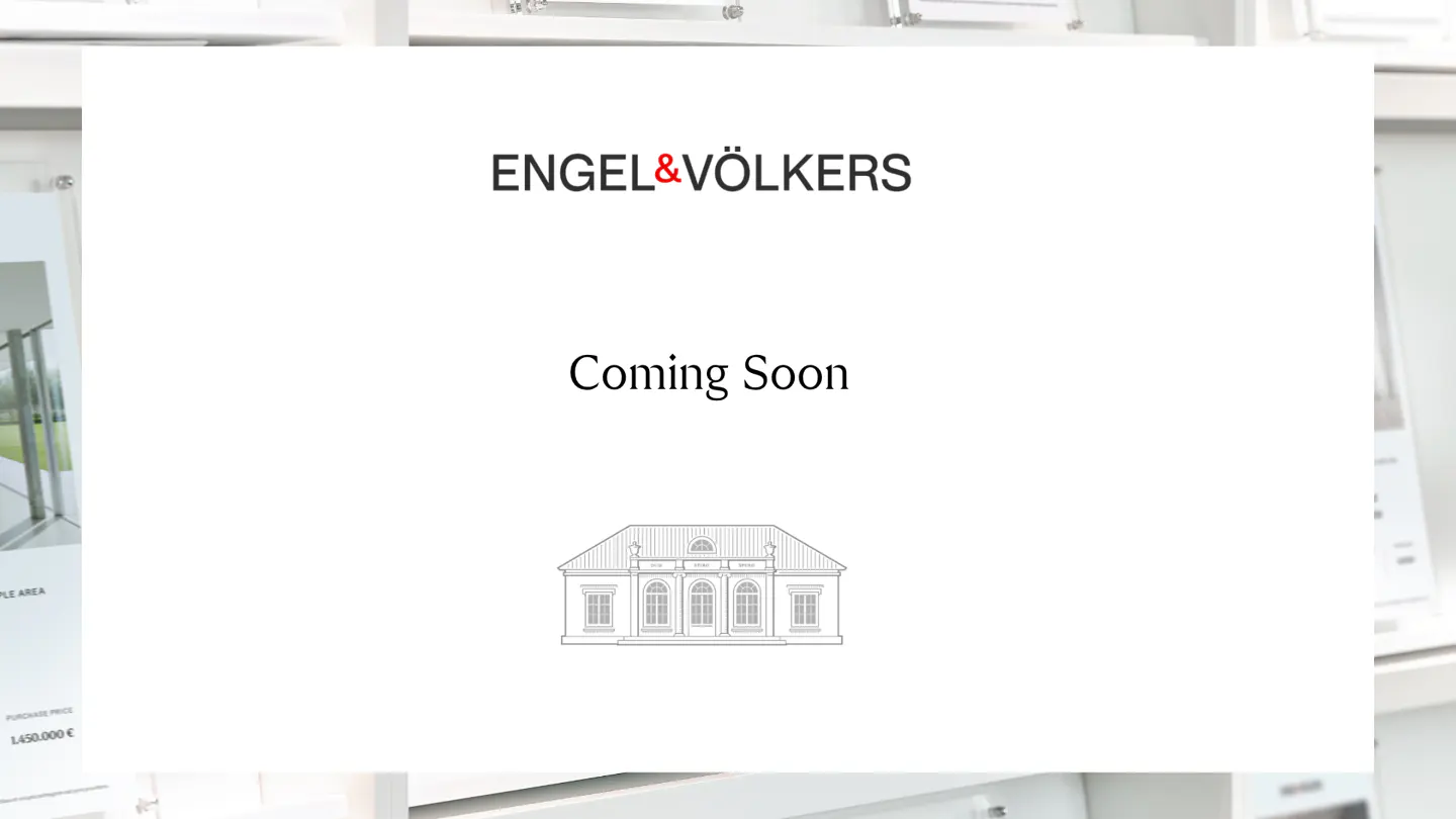 Engel & Völkers "Coming Soon" real estate sign with a line drawing of a house.
