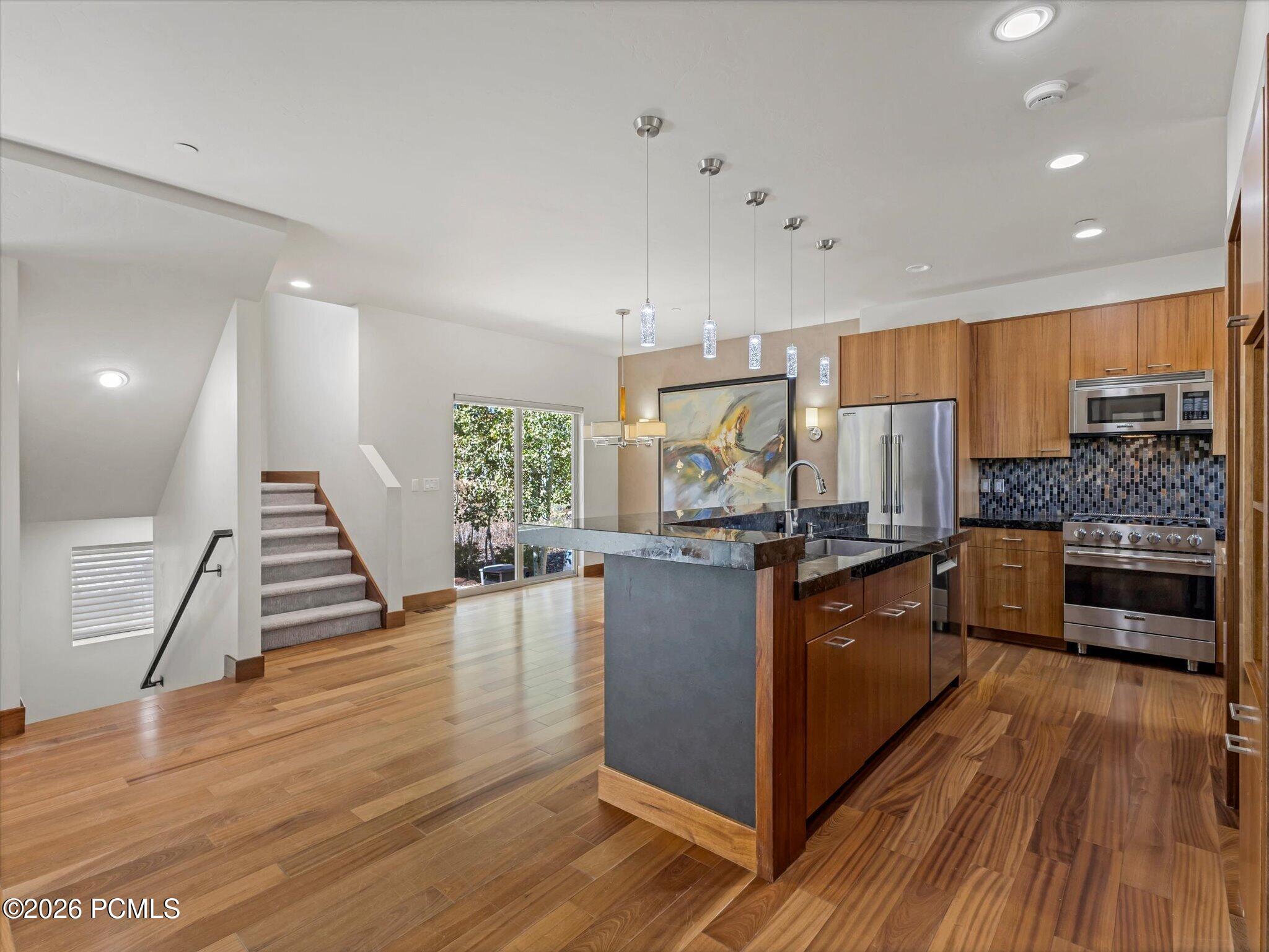 Upgraded Cedar Ridge's Four-Bedroom Townhome