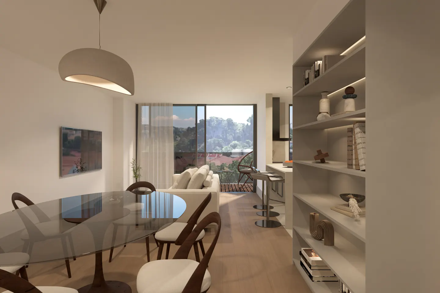 Interior view of a modern apartment with a glass dining table, white chairs, and a bookshelf filled with books and decorative objects. A white sofa is visible in the background.