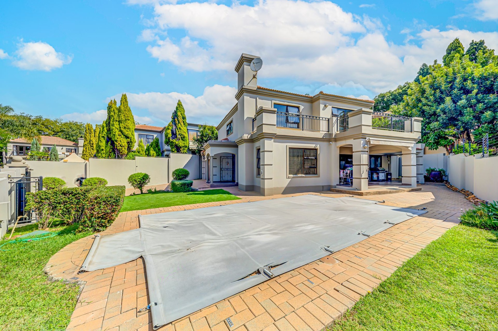 Contemporary Elegance in a Secure, Intimate Residential Enclave