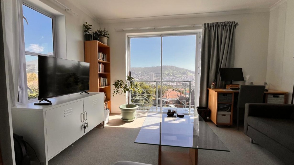 Bright corner apartment with stunning views & covered parking