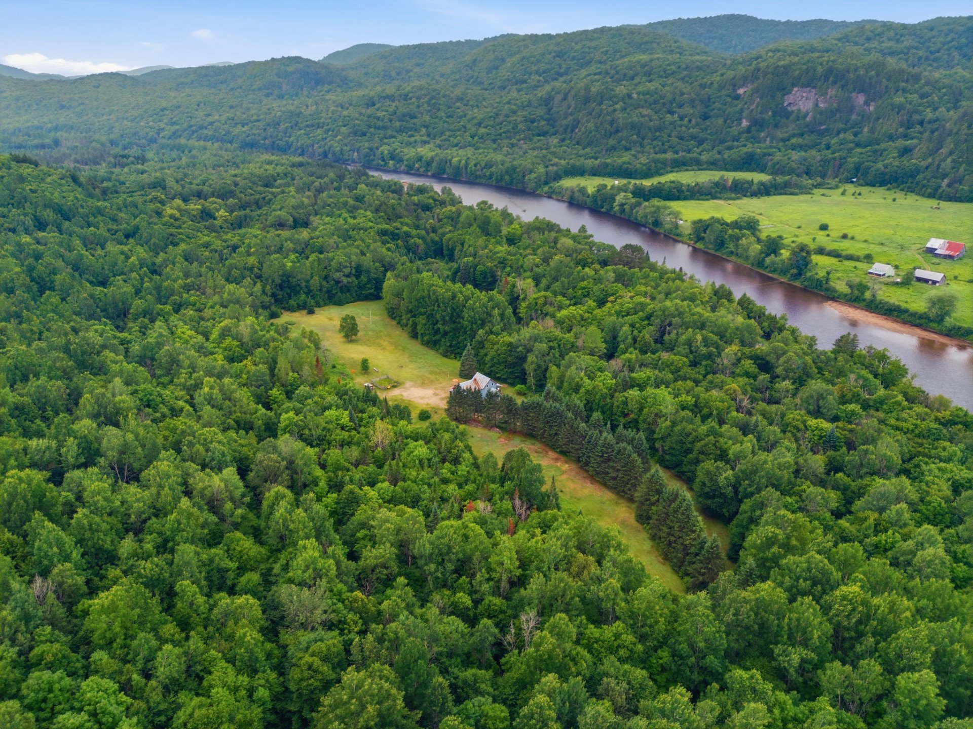 Nestled in the heart of wooded acres