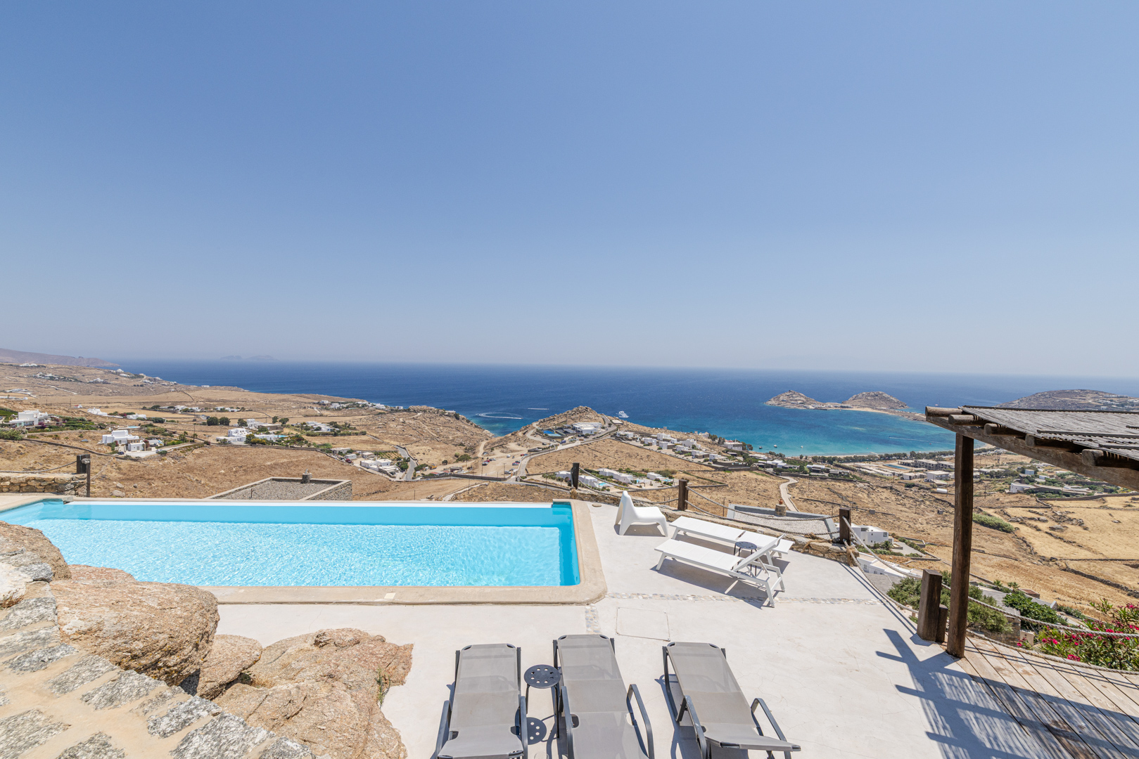 Elegant stone villa with panoramic sea views and infinity pool in Kalafatis
