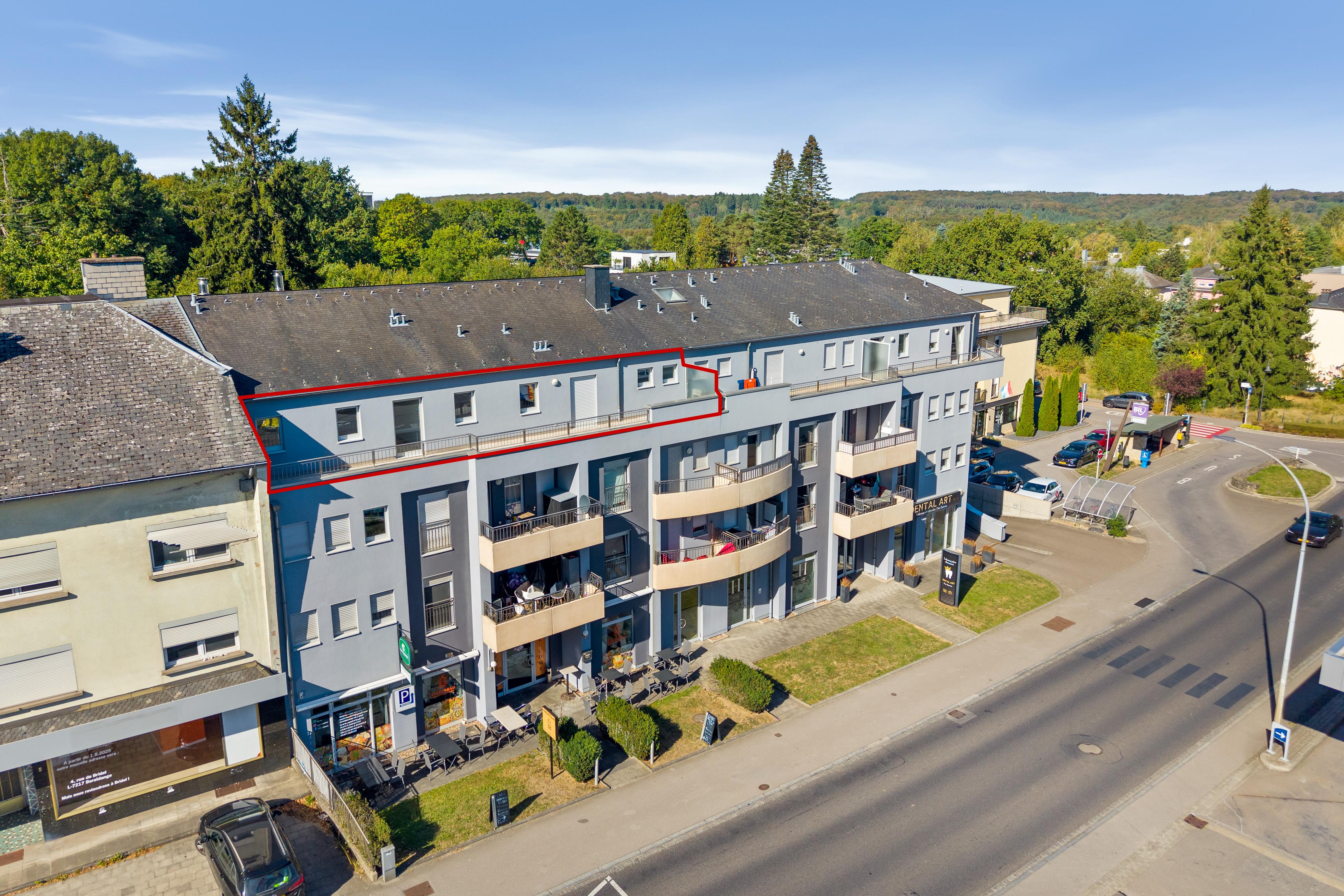 1-Schlafzimmer-Wohnung im obersten Stock mit großer Terrasse in Bridel