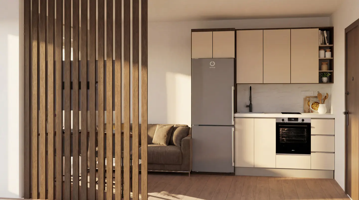 A modern apartment interior with a wooden slat partition, a gray fridge, and beige kitchen cabinets. A brown sofa is visible in the background.