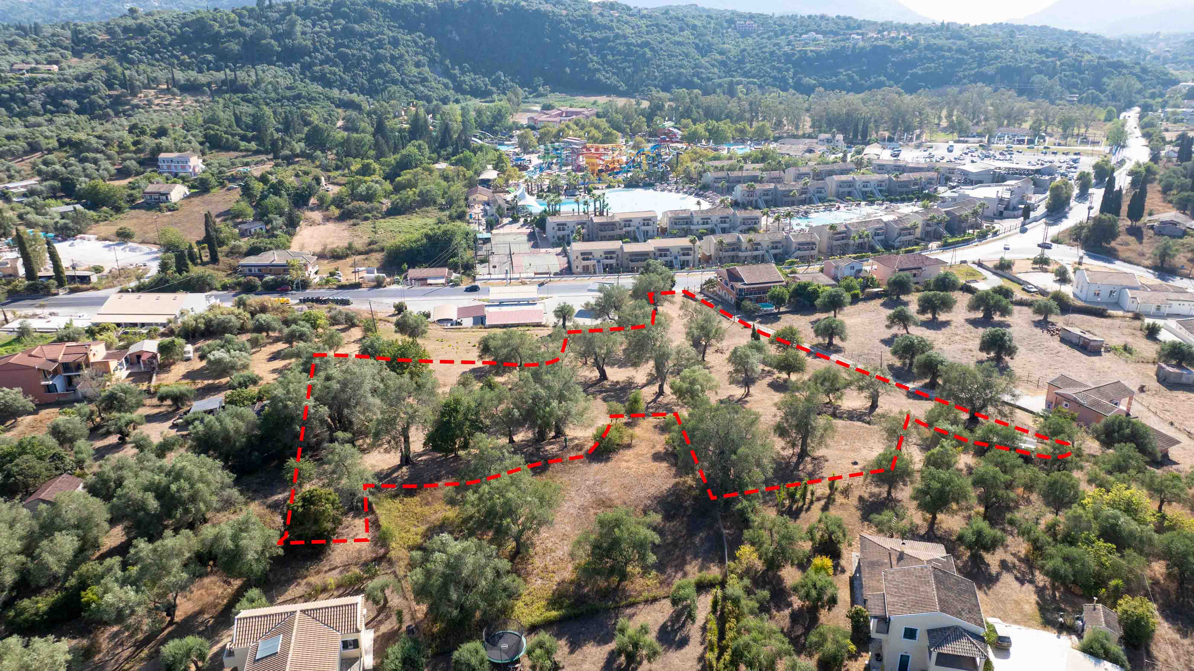 Investment plot with facade opposite Aqualand in Agios Ioannis , Corfu