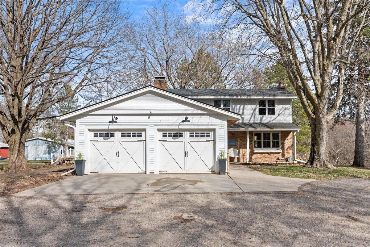 Montrose Acreage Estate: 15 Acres with Pond & Pole Barn