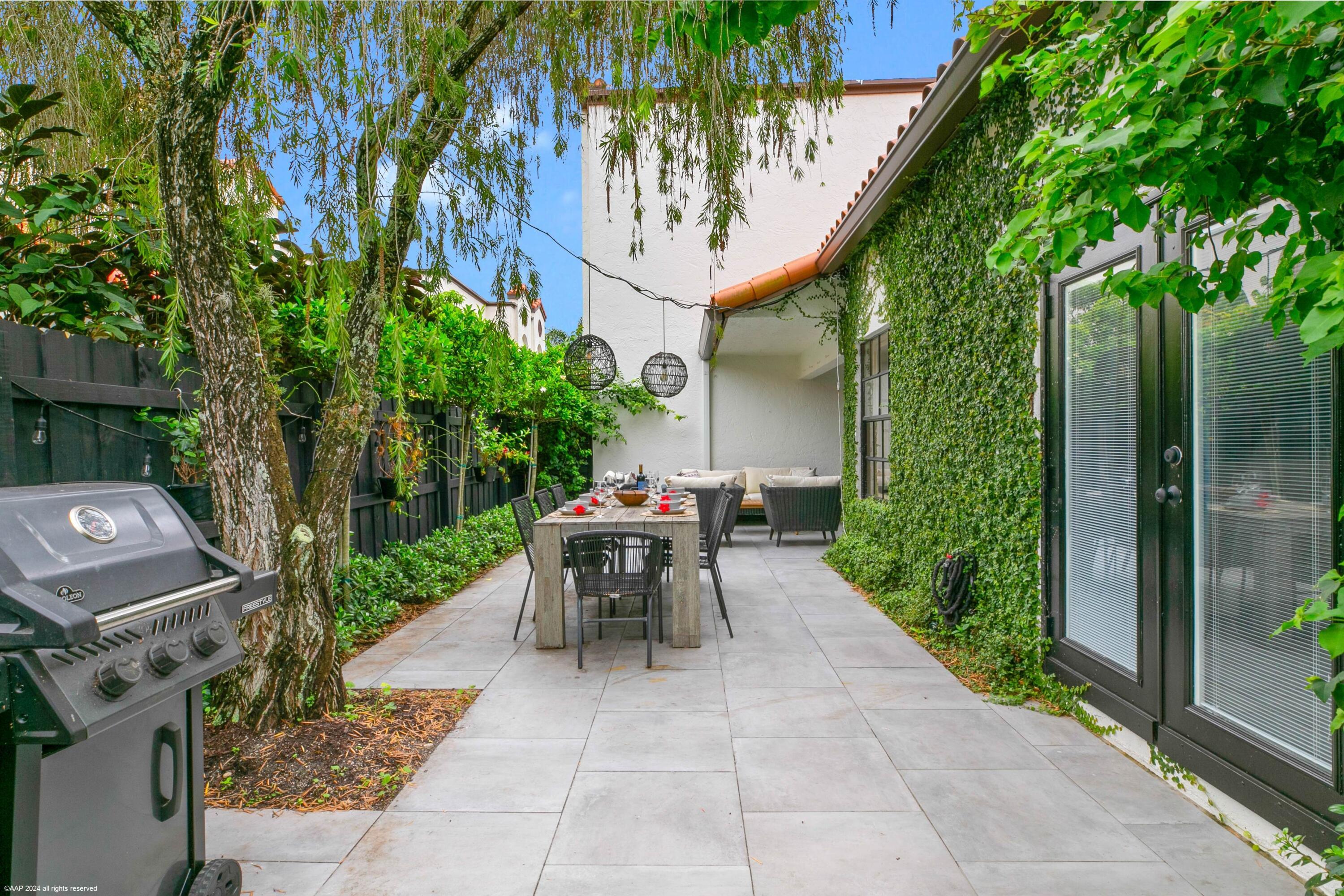 Charming End-Unit Villa with Private Patio & Garage
