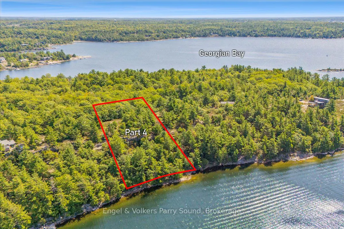 Aerial view of a wooded lot on Georgian Bay, outlined in red, labeled "Part 4". Water surrounds the property.