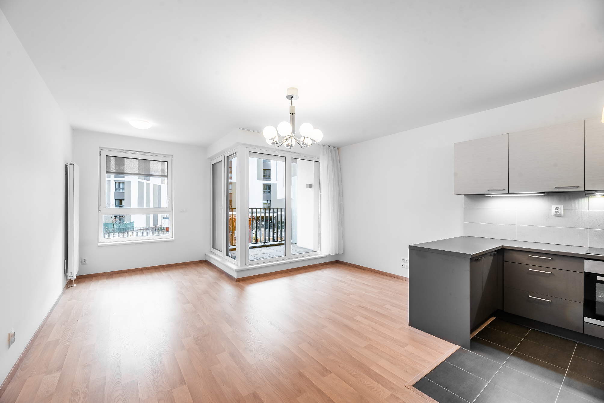 Rent a 3+kt apartment in a new building near the park, with a balcony and a garage
