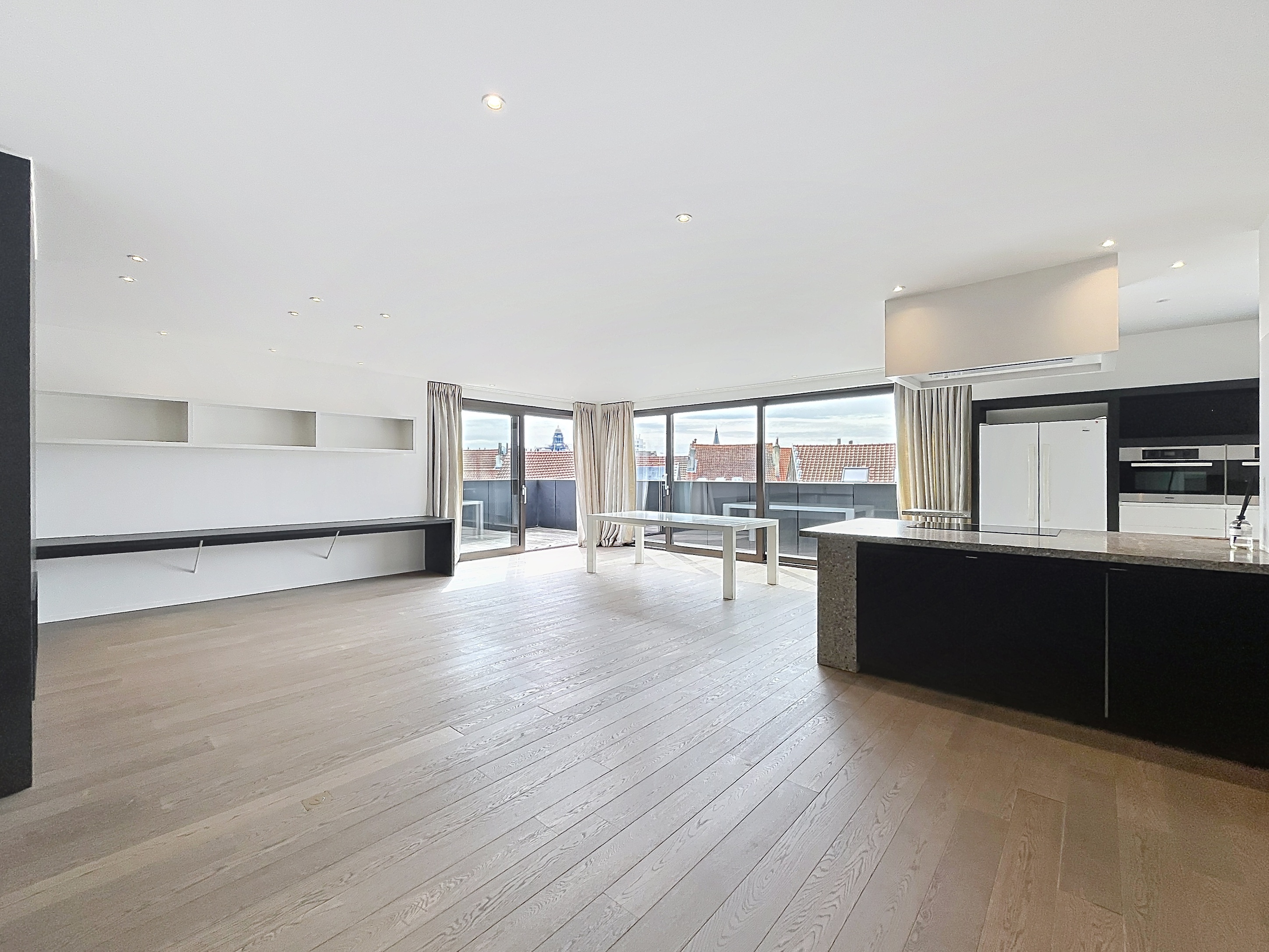 Superbe penthouse 2 chambres avec vaste terrasse et parking au cœur de Bruxelles