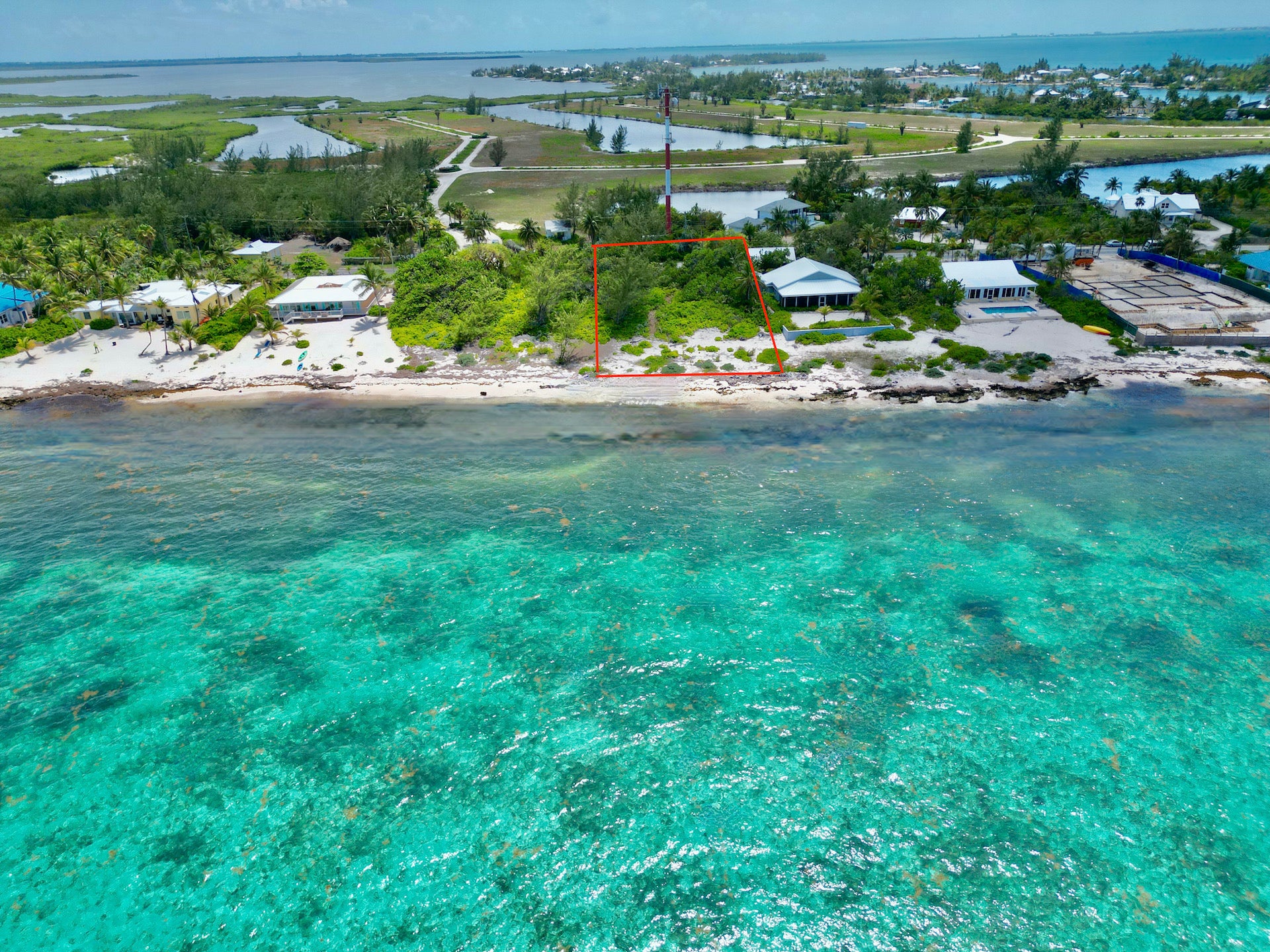 RUM POINT BEACHFRONT LOT WITH CORAL REEF