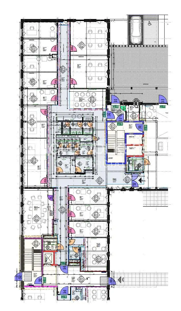 Floor plan blueprint of a building with offices, a central atrium, stairs, and a parking garage at the top.