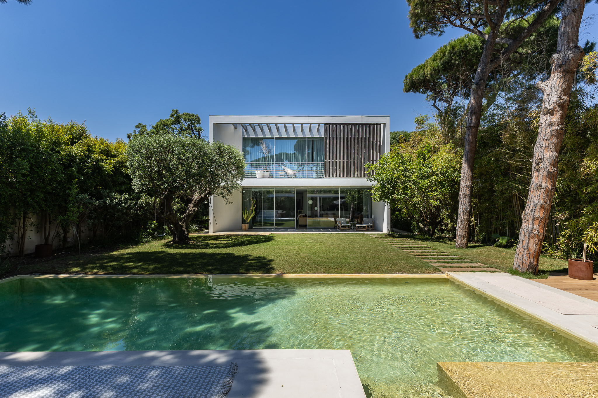 Designer home steps from the sea