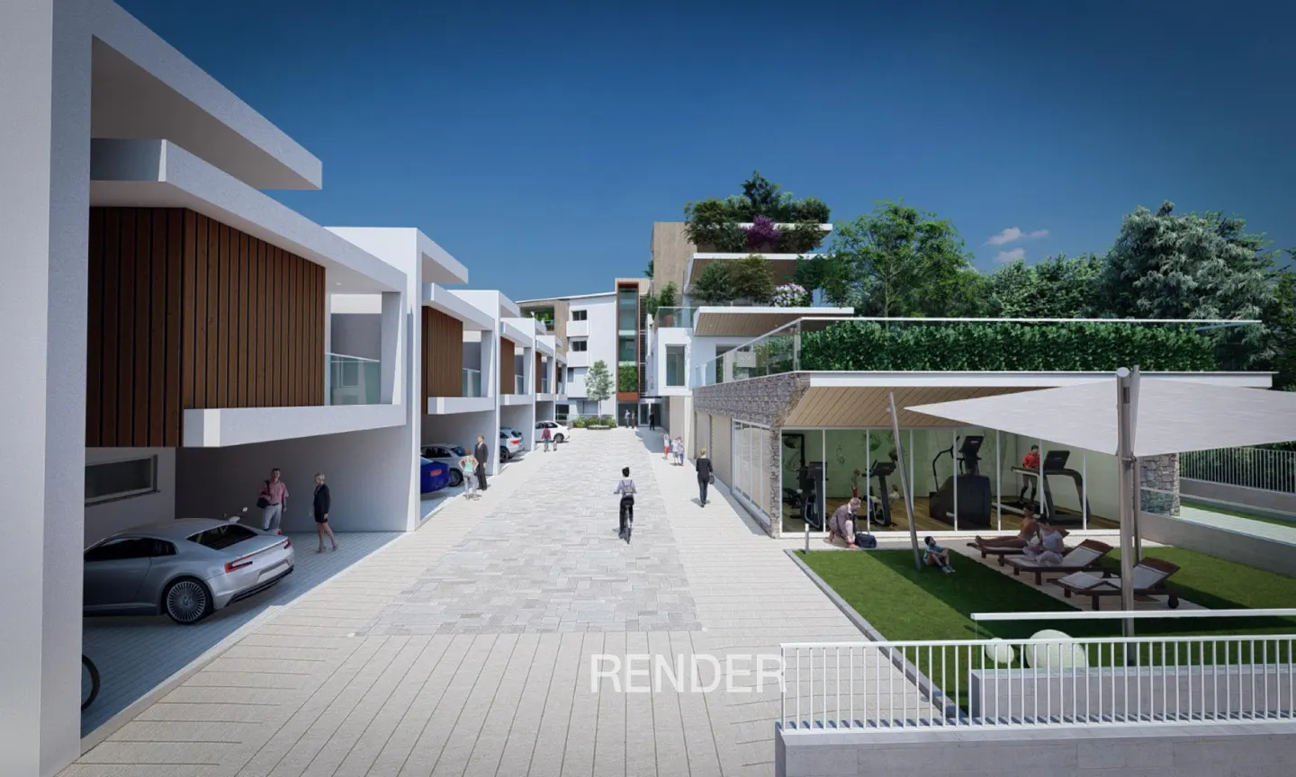 Modern residential complex with white buildings, a paved courtyard, a gym, and a green lawn with lounge chairs.
