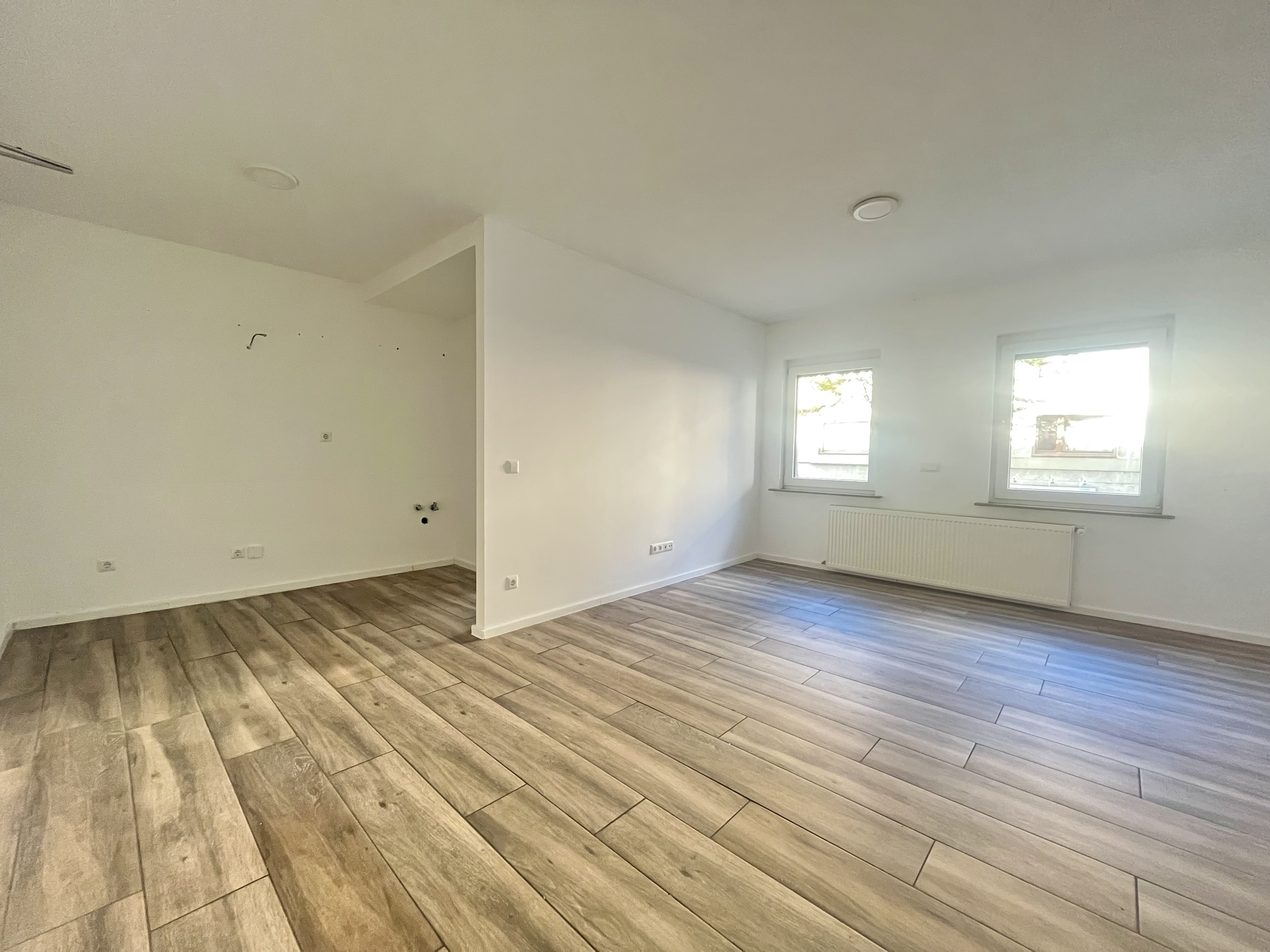 Modernisiertes 1-Zimmer-Apartment mit eigener Garage