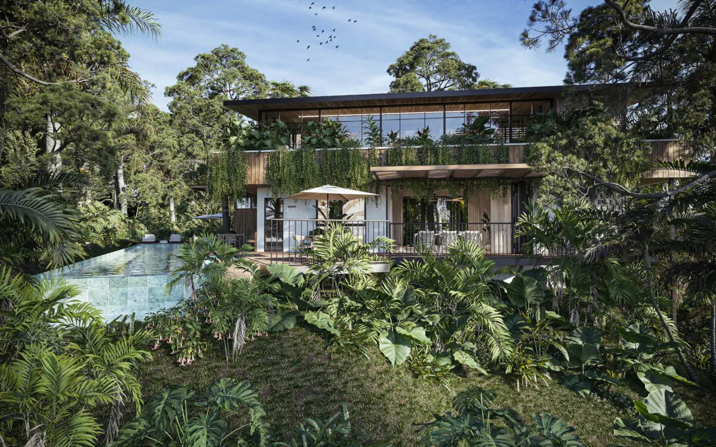 Two-story modern house with a flat roof, surrounded by lush green tropical vegetation and a pool.