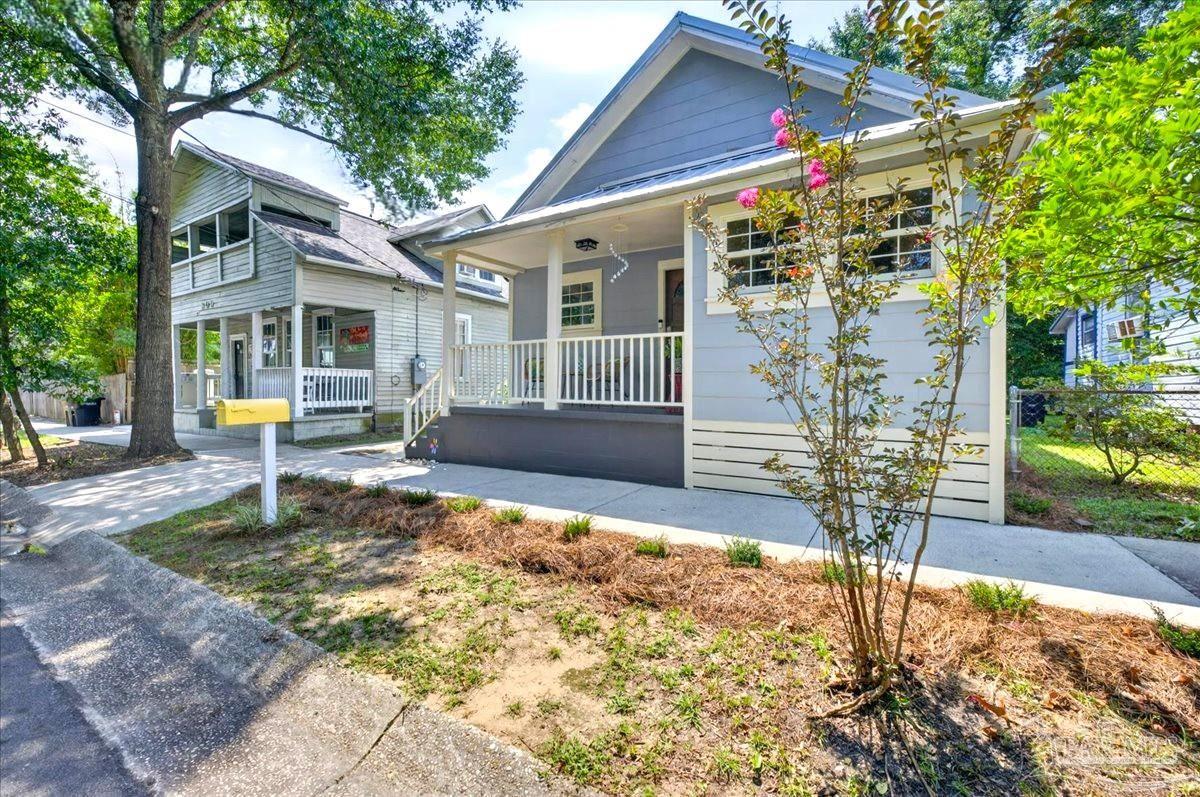 Tropical Charm Meets Turn Key Living in Old East Hill