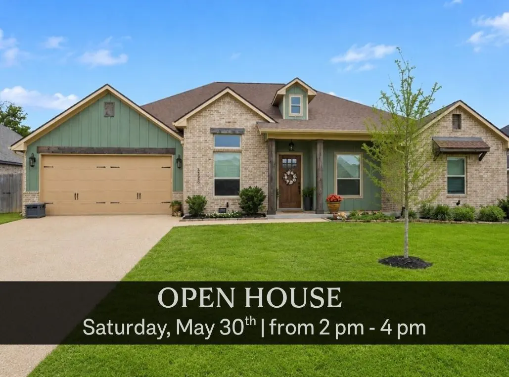 Open house image of a single-story home with a green lawn, brick and green siding, and a brown roof.