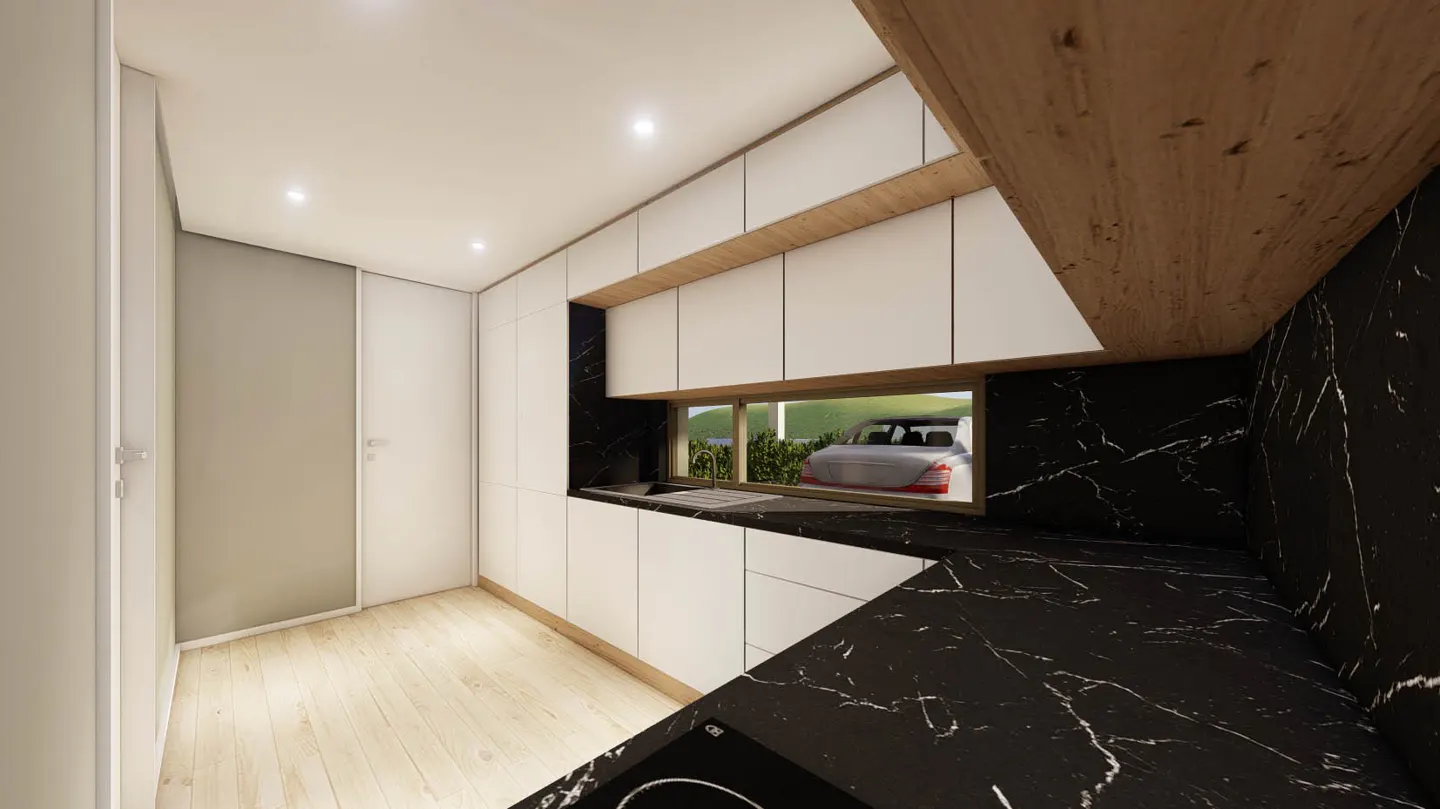 Modern kitchen with white cabinets, black marble countertops, and a window view of a car. Light wood floors and ceiling accents.