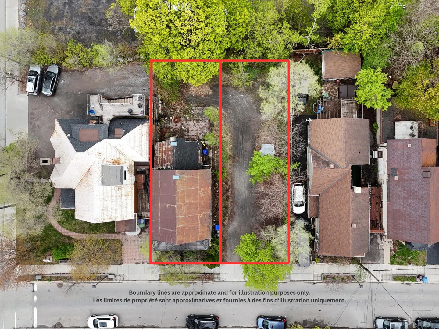Aerial view of a residential property with red outlines highlighting the lot boundaries between two houses.