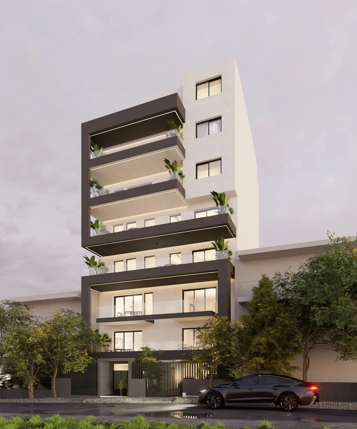 Modern apartment building with black trim and balconies, surrounded by trees and a black car parked nearby.