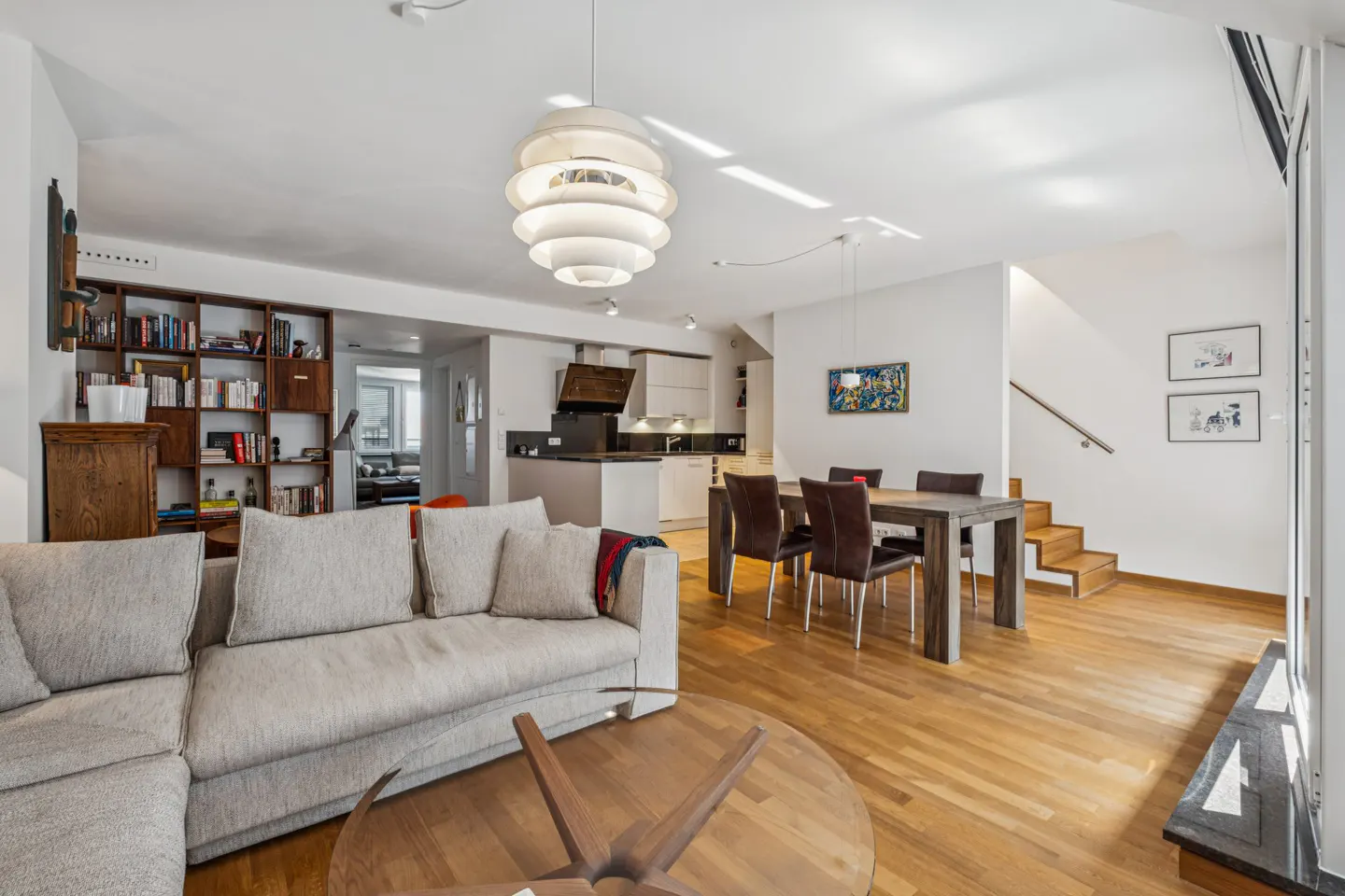 Bright and inviting living and dining area with an efficient, well-considered layout.