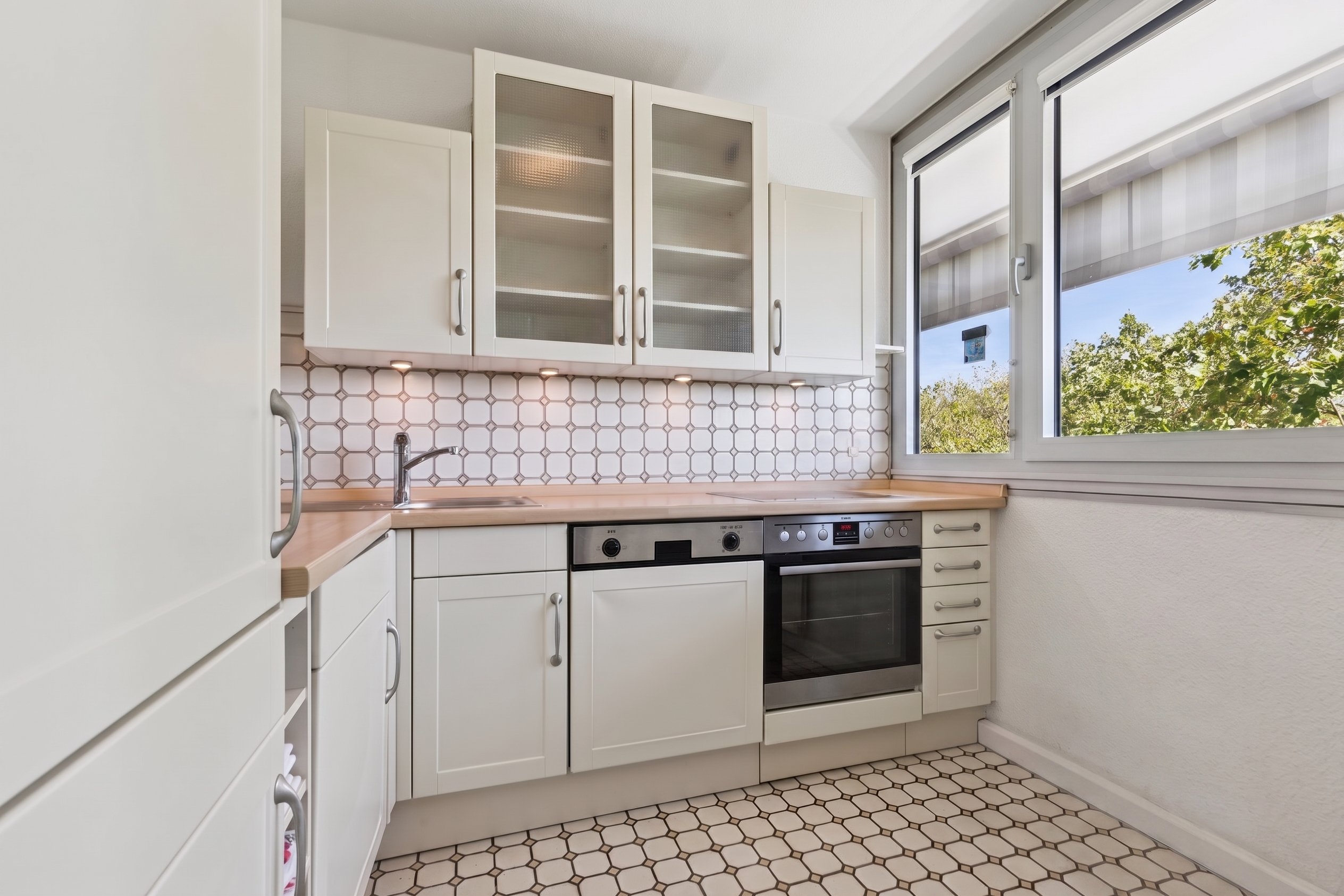 2-room apartment with spacious balcony and views of the greenbelt [AI-modified]