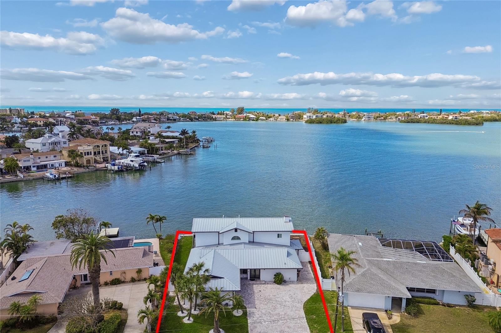 The Heart of the Home, Framed by Waterfront Views