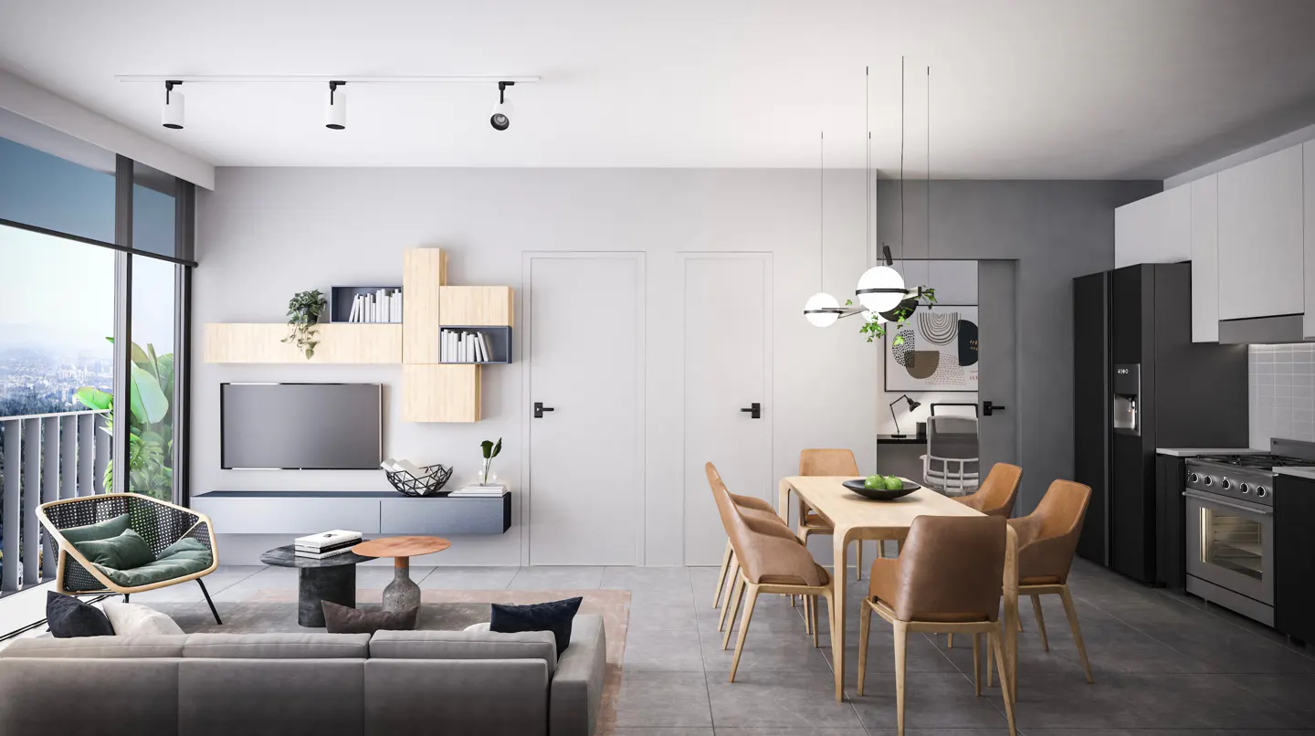 Modern open-plan living area with a grey sofa, dining table with tan chairs, and a sleek kitchen with black appliances.